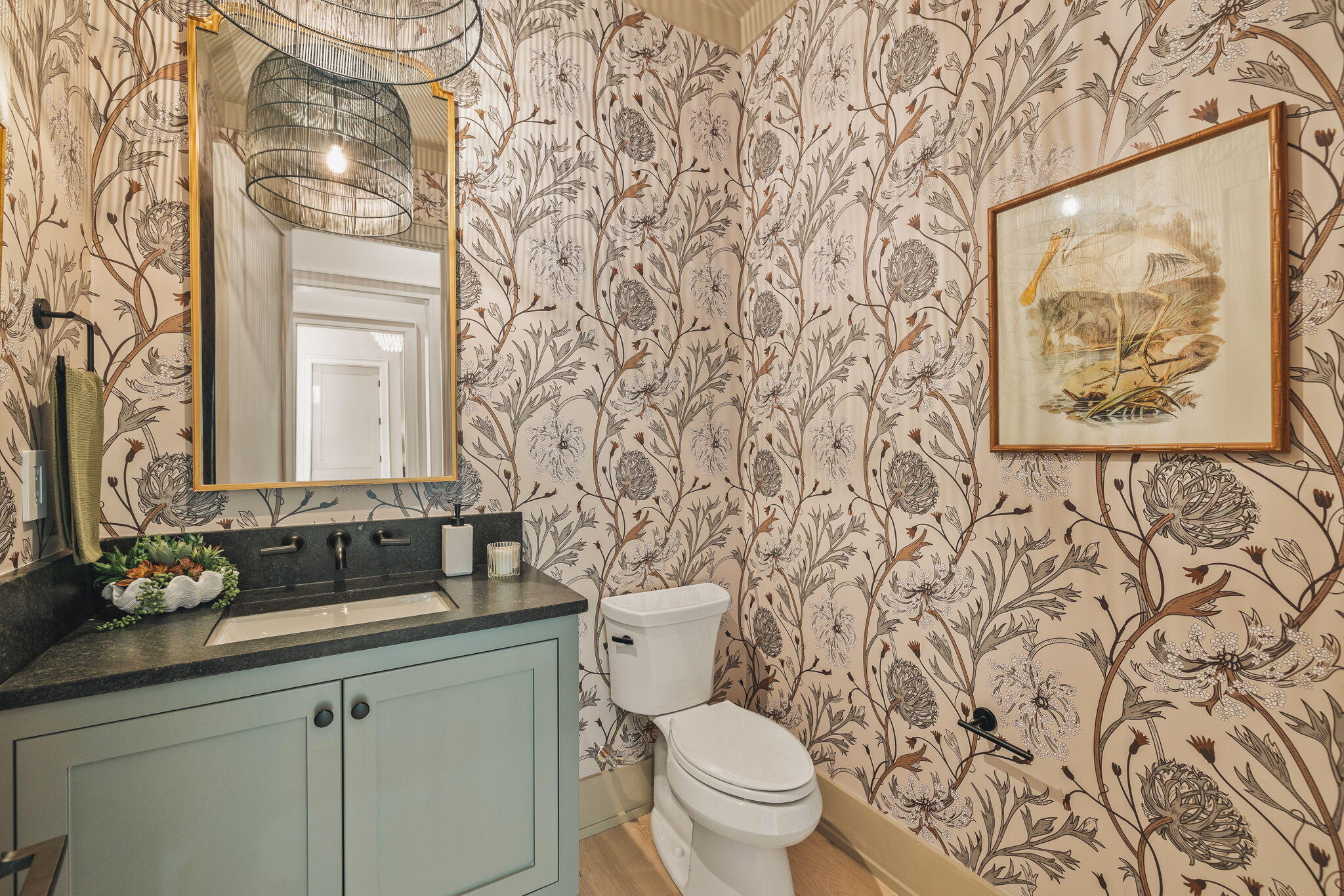 157 Blue Lake Road Santa Rosa Beach, FL 32459 - Photo 36 of 83 a bathroom with a toilet sink and mirror