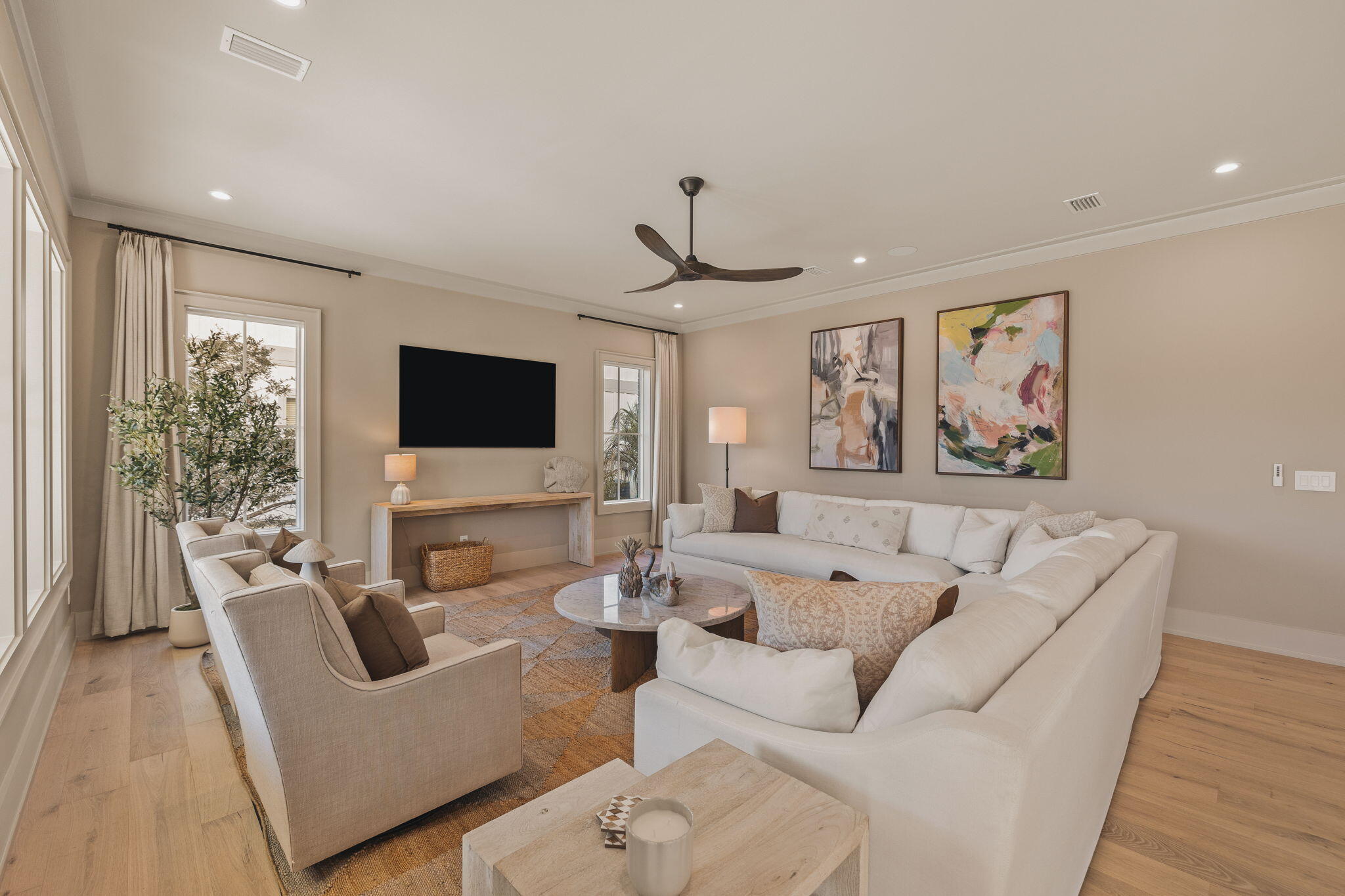 157 Blue Lake Road Santa Rosa Beach, FL 32459 - Photo 44 of 83 a living room with furniture and a flat screen tv
