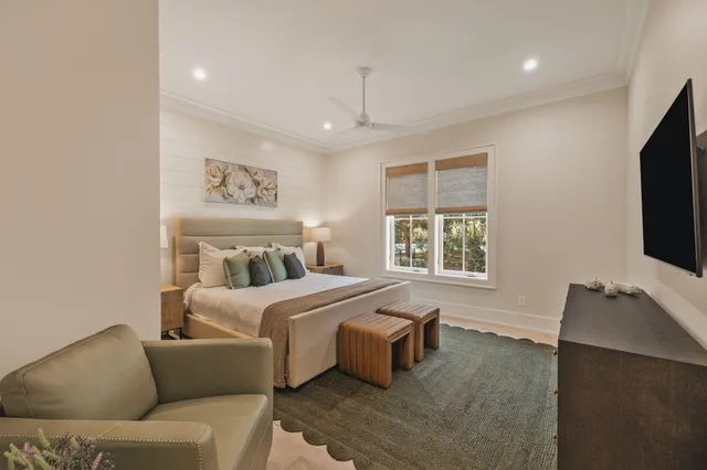 a bathroom with a double vanity sink mirror and shower