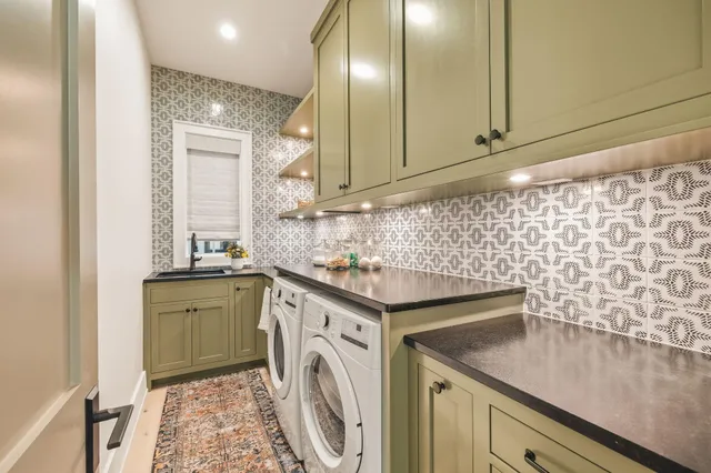 an aerial view of a houses with ocean view