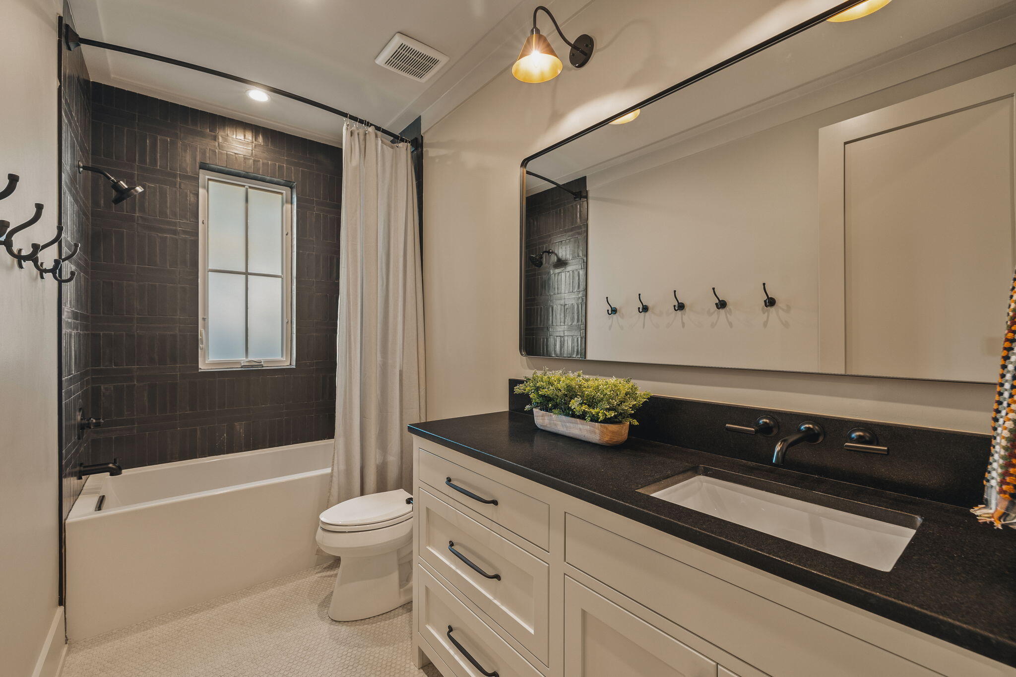 157 Blue Lake Road Santa Rosa Beach, FL 32459 - Photo 72 of 83 a bathroom with a granite countertop sink a toilet and shower