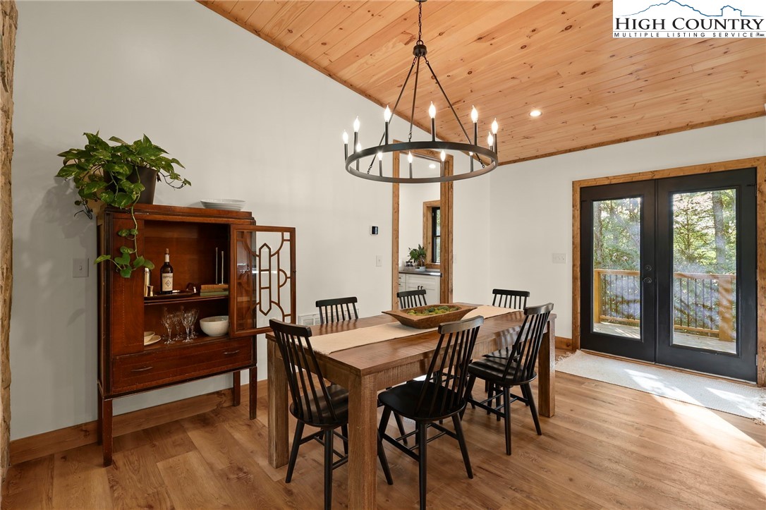 10 Maple Lane Newland, NC 28657 - Photo 11 of 22 a view of a dining room with furniture window and wooden floor