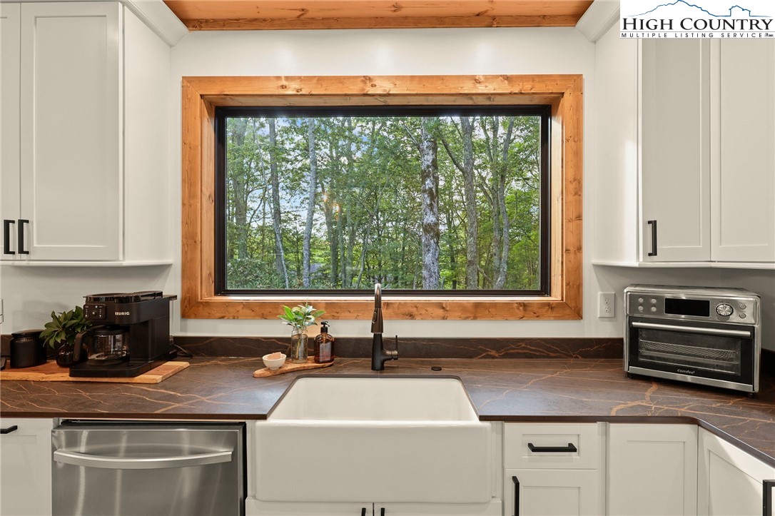 10 Maple Lane Newland, NC 28657 - Photo 13 of 22 a kitchen with a sink and a window