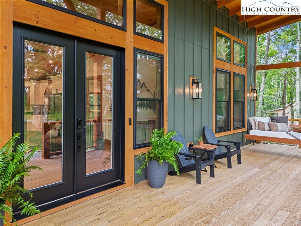 10 Maple Lane Newland, NC 28657 - Photo 3 of 22 a view of a house with backyard and sitting area