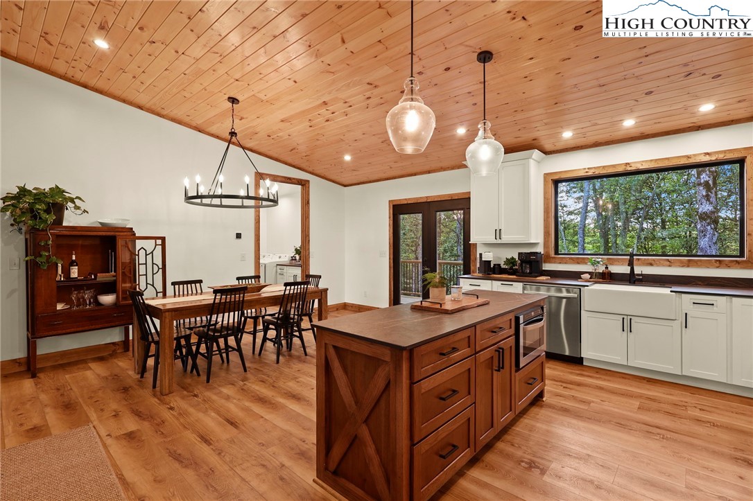 10 Maple Lane Newland, NC 28657 - Photo 10 of 22 a large kitchen with lots of counter space and dining table