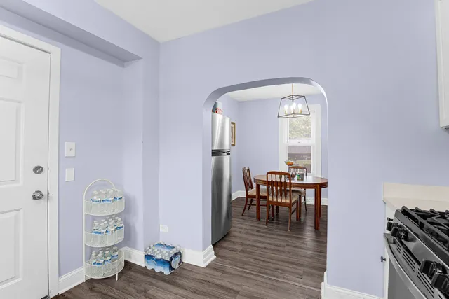 a view of a livingroom with furniture and wooden floor