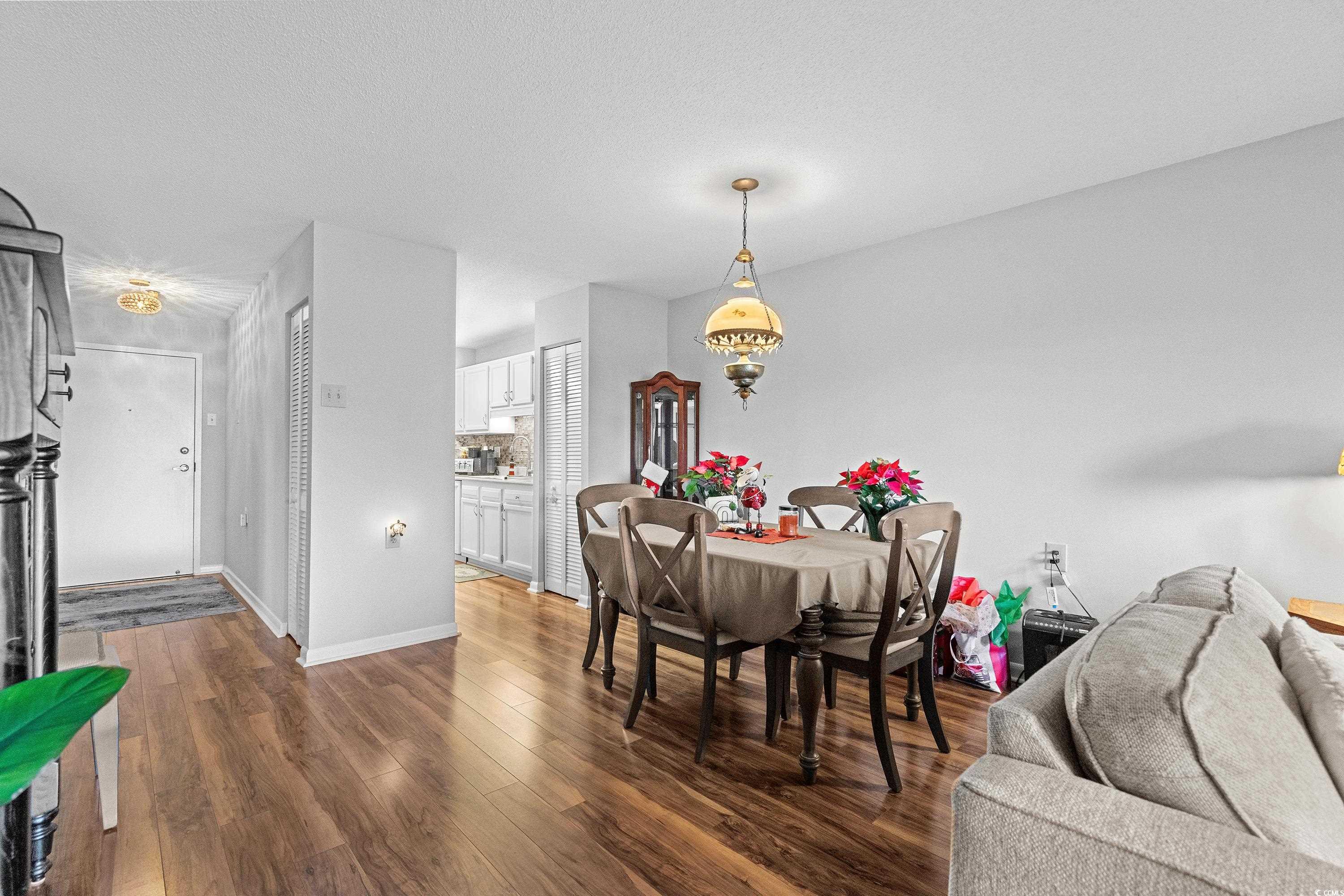 5001 Little River Road, Unit E219 Myrtle Beach, SC 29577 - Photo 8 of 34 Dining area with dark hardwood / wood-style floors