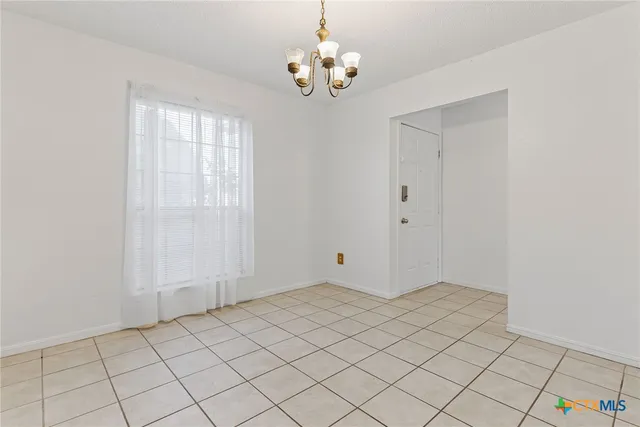 a view of an empty room with window