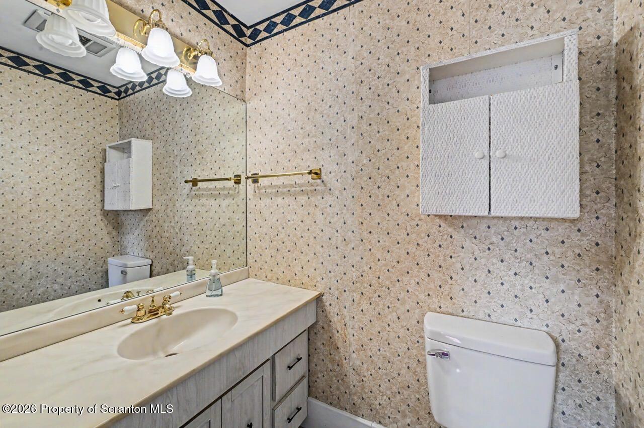 502 Layton Road Clarks Summit, PA 18411 - Photo 26 of 42 a bathroom with a sink toilet and shower