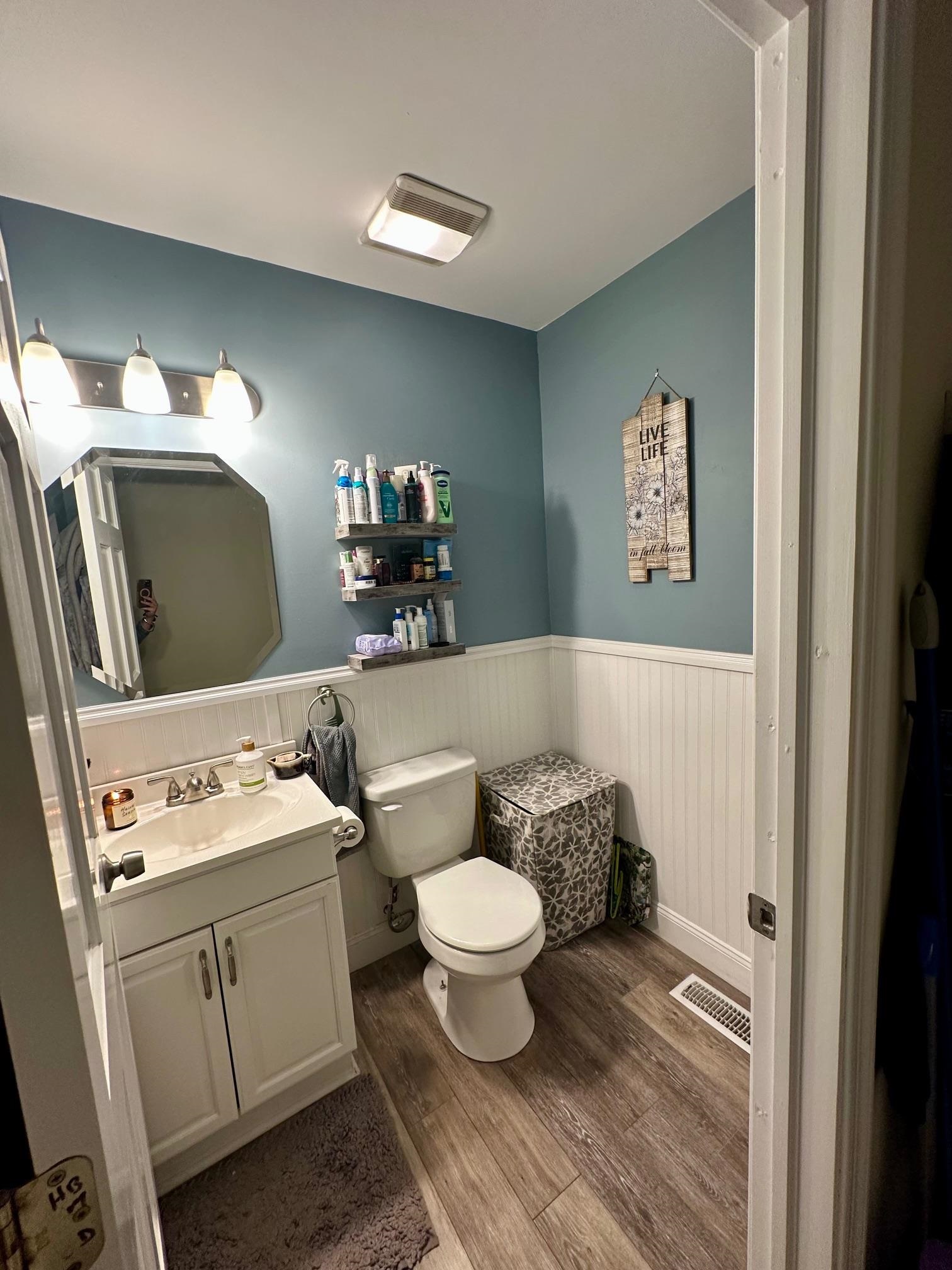 126 Newell Road Heislerville, NJ 08324 - Photo 11 of 20 a bathroom with a toilet sink and mirror