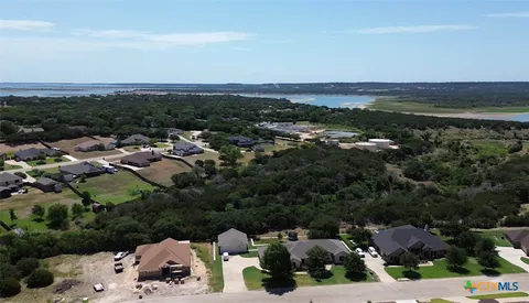 an aerial view of a city with lots of residential buildings
