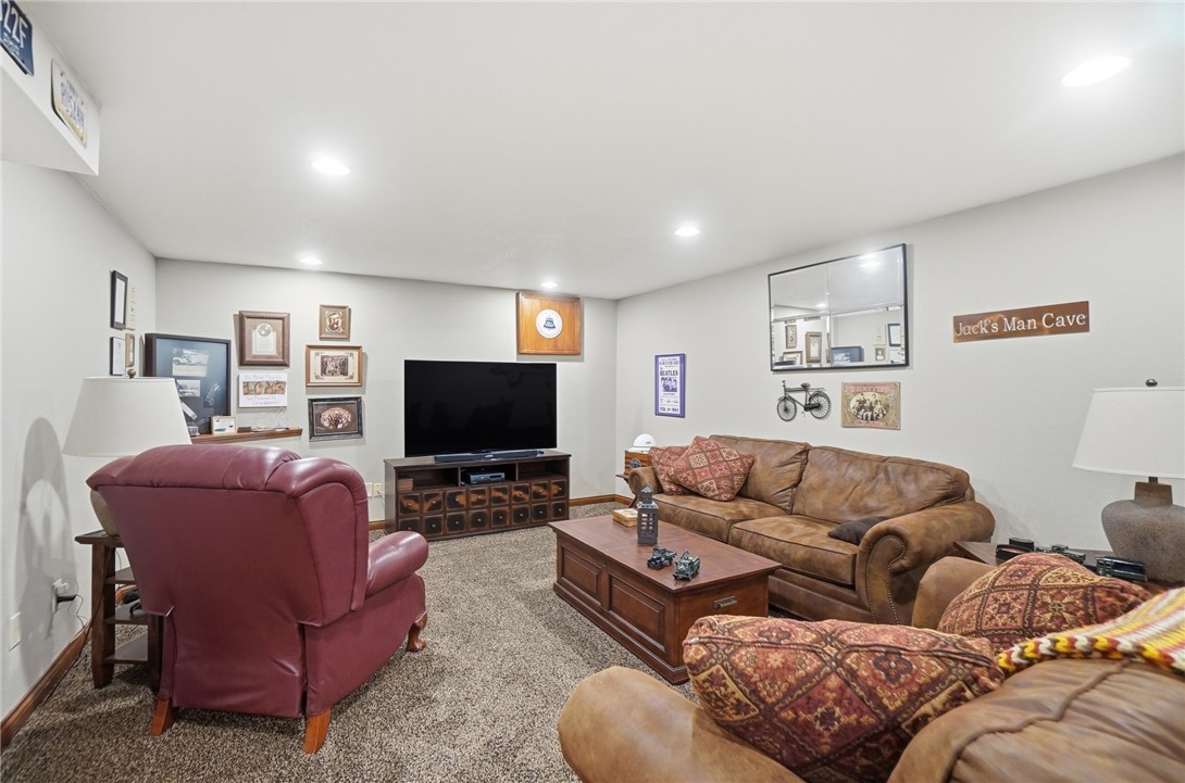 5300 Brookshire Lane Springfield, OH 45502 - Photo 44 of 56 This cozy living area features recessed lighting and plush carpeting for ultimate comfort.