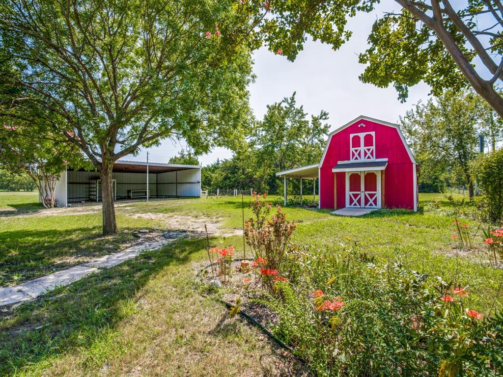 290 East Forest Grove Road Lucas, TX 75002 - Photo 3 of 8 a view of a house with a yard