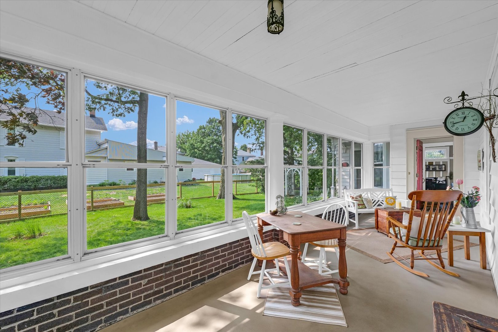 320 East Locust Street Watseka, IL 60970 - Photo 18 of 95 a living room with furniture and a floor to ceiling window