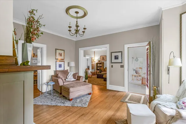 a kitchen with stainless steel appliances kitchen island granite countertop a refrigerator and a stove