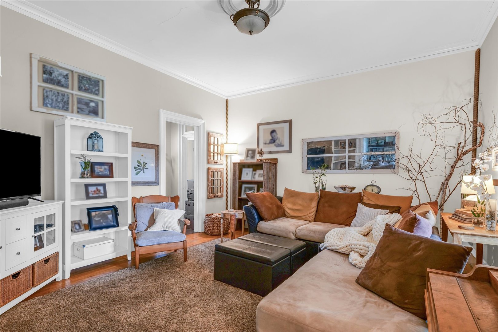 320 East Locust Street Watseka, IL 60970 - Photo 26 of 95 a living room with furniture and a flat screen tv