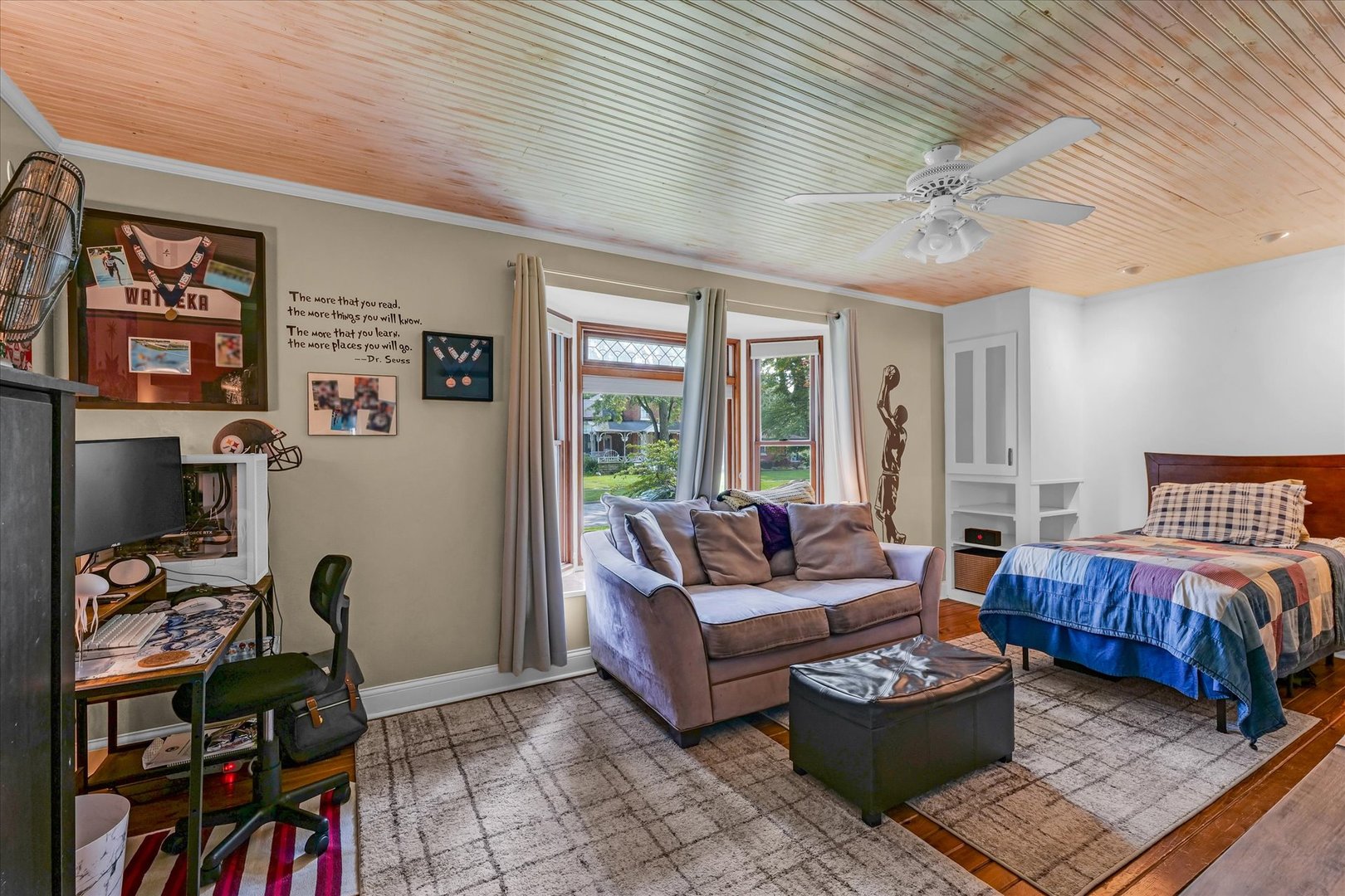 320 East Locust Street Watseka, IL 60970 - Photo 30 of 95 a living room with furniture a rug and a large window