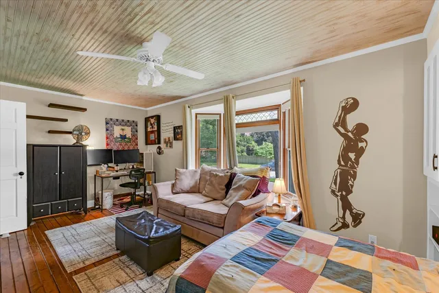 a bathroom with a sink a mirror and a window