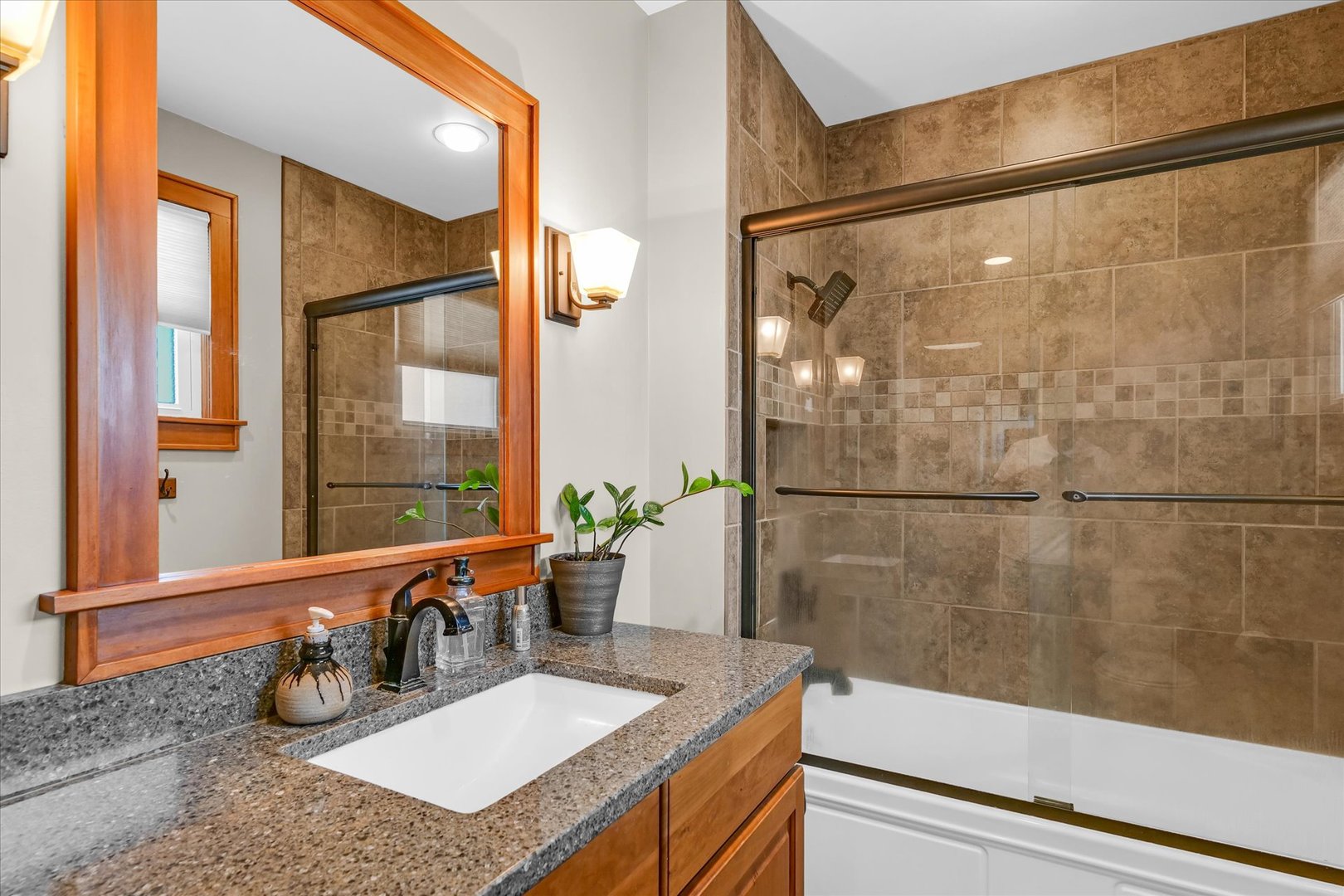 320 East Locust Street Watseka, IL 60970 - Photo 36 of 95 a bathroom with a sink and a mirror