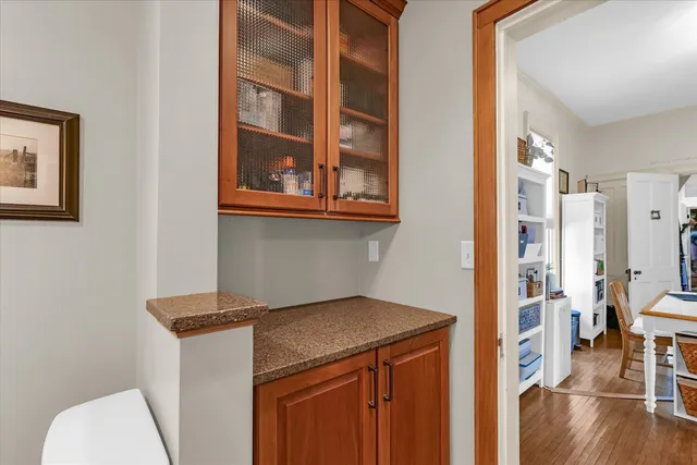 a bedroom with a bed and ceiling fan