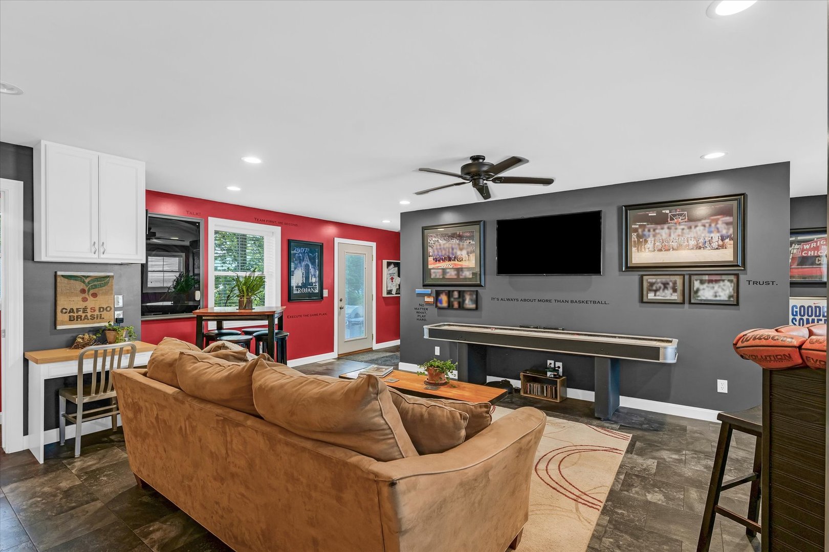 320 East Locust Street Watseka, IL 60970 - Photo 48 of 95 a living room with furniture and a flat screen tv