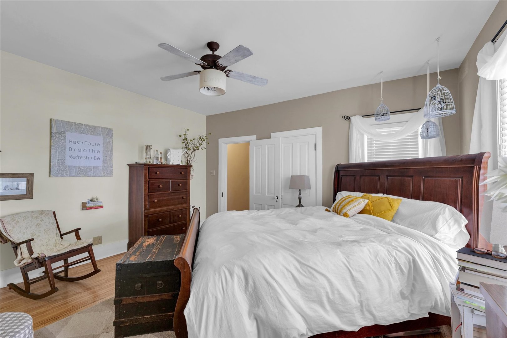 320 East Locust Street Watseka, IL 60970 - Photo 66 of 95 a bedroom with a bed and ceiling fan