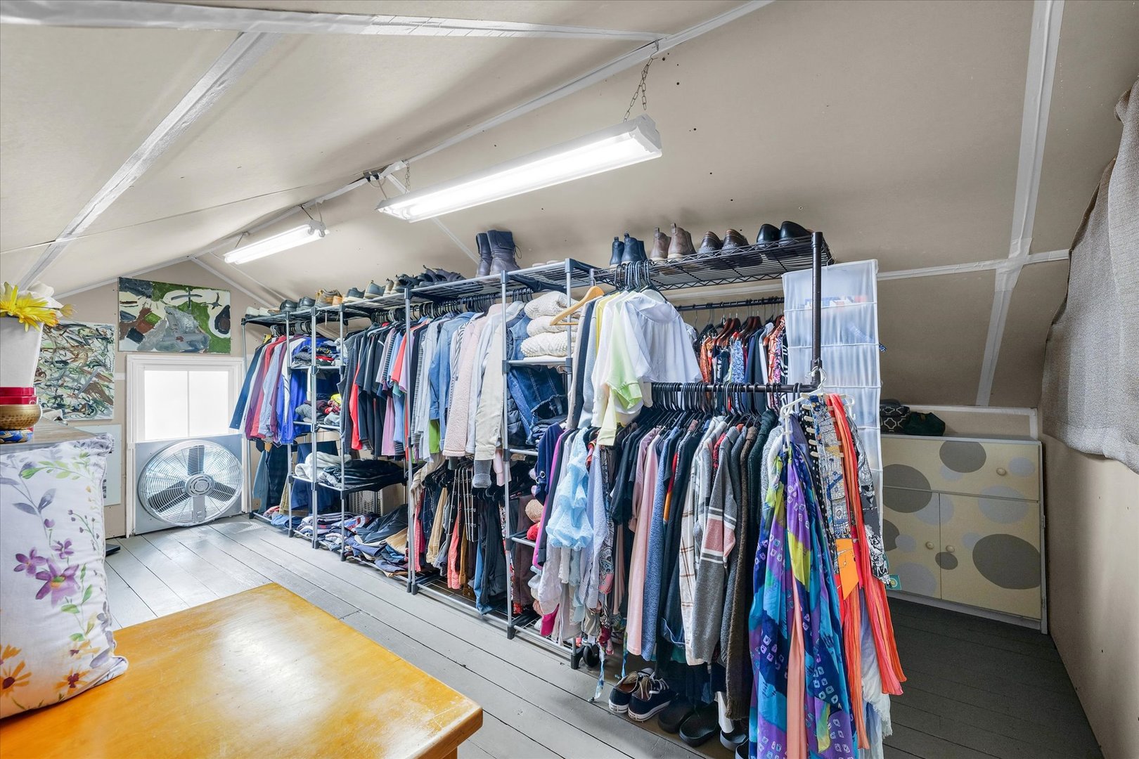 320 East Locust Street Watseka, IL 60970 - Photo 69 of 95 a view of walk in closet with clothes and shoes