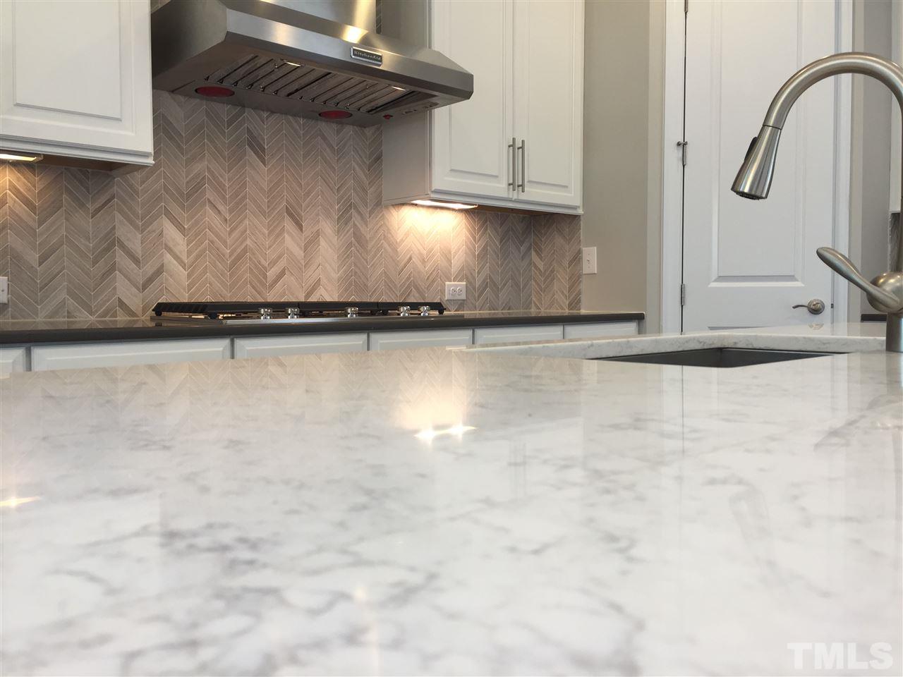 8113 Greys Landing Way, Unit 8 Raleigh, NC 27615 - Photo 3 of 25 Quartz counter tops and KitchenAid appliances
