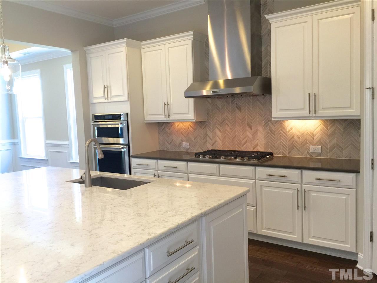 8113 Greys Landing Way, Unit 8 Raleigh, NC 27615 - Photo 4 of 25 Oversized kitchen island