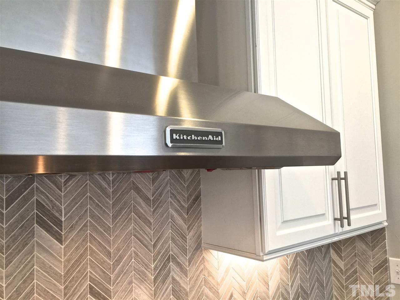 8113 Greys Landing Way, Unit 8 Raleigh, NC 27615 - Photo 5 of 25 Great stainless steel commercial feel in the kitchen