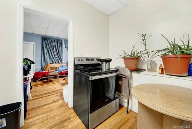 a white refrigerator freezer sitting inside of a kitchen