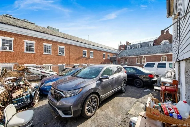 a car parked in front of a house