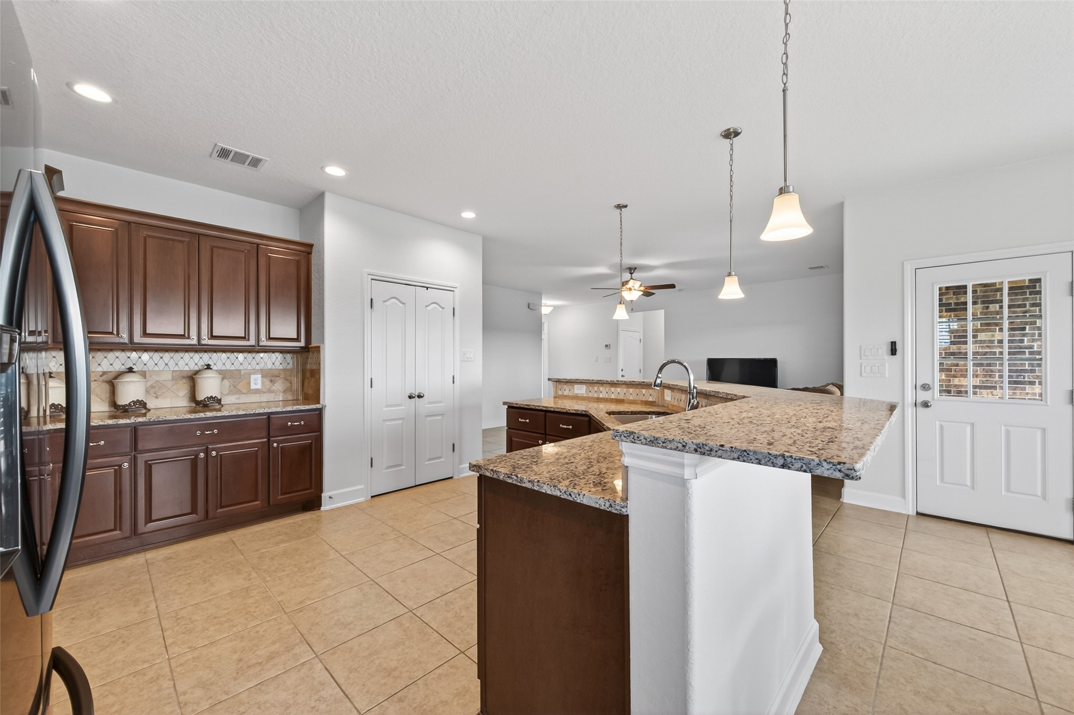 13506 Moody Road Needville, TX 77461 - Photo 14 of 36 Kitchen with Breakfast Bar