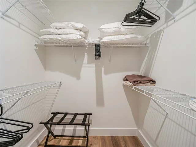 a view of storage and utility room with racks on the wall