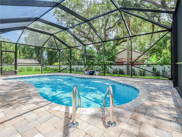 a view of yard with a patio