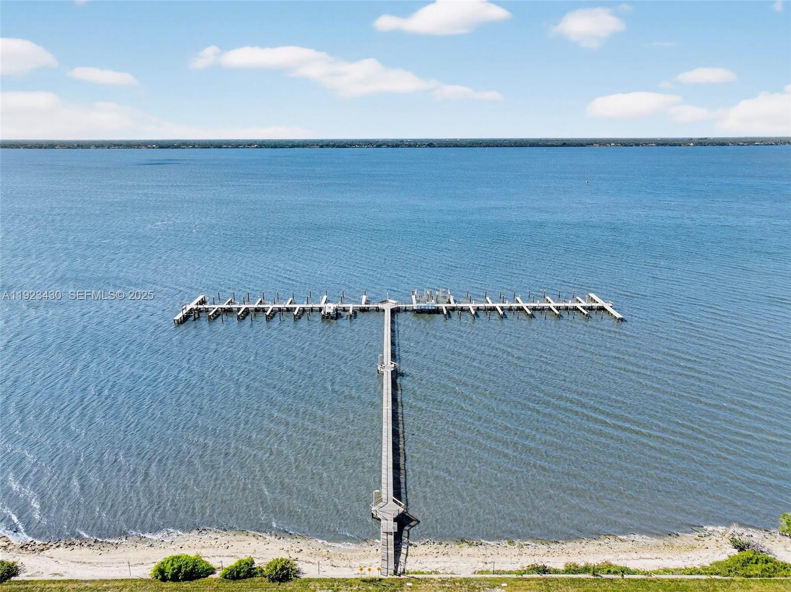 8308 South Ocean Drive Jensen Beach, FL 34957 - Photo 14 of 21 a view of outdoor space and yard