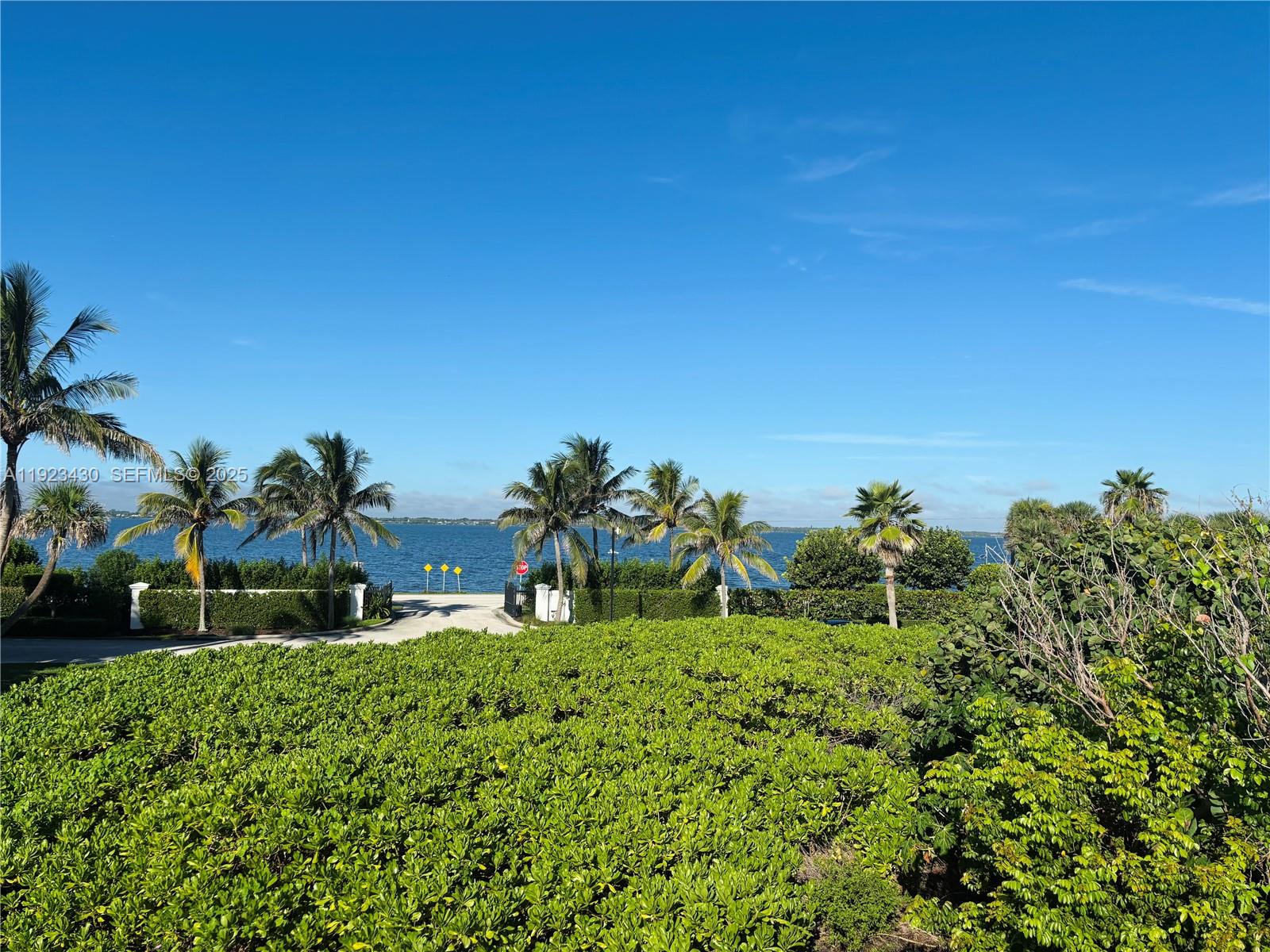 8308 South Ocean Drive Jensen Beach, FL 34957 - Photo 18 of 21 a view of outdoor space with garden