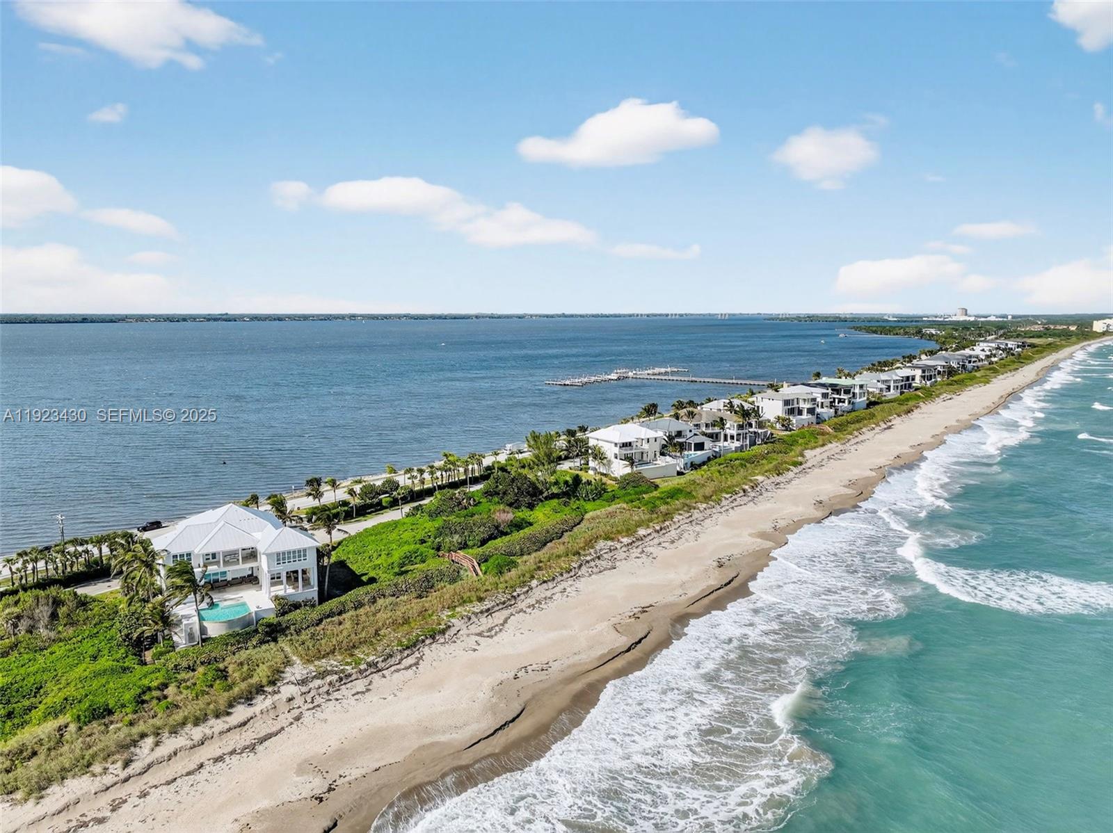8308 South Ocean Drive Jensen Beach, FL 34957 - Photo 4 of 21 a view of an ocean and beach
