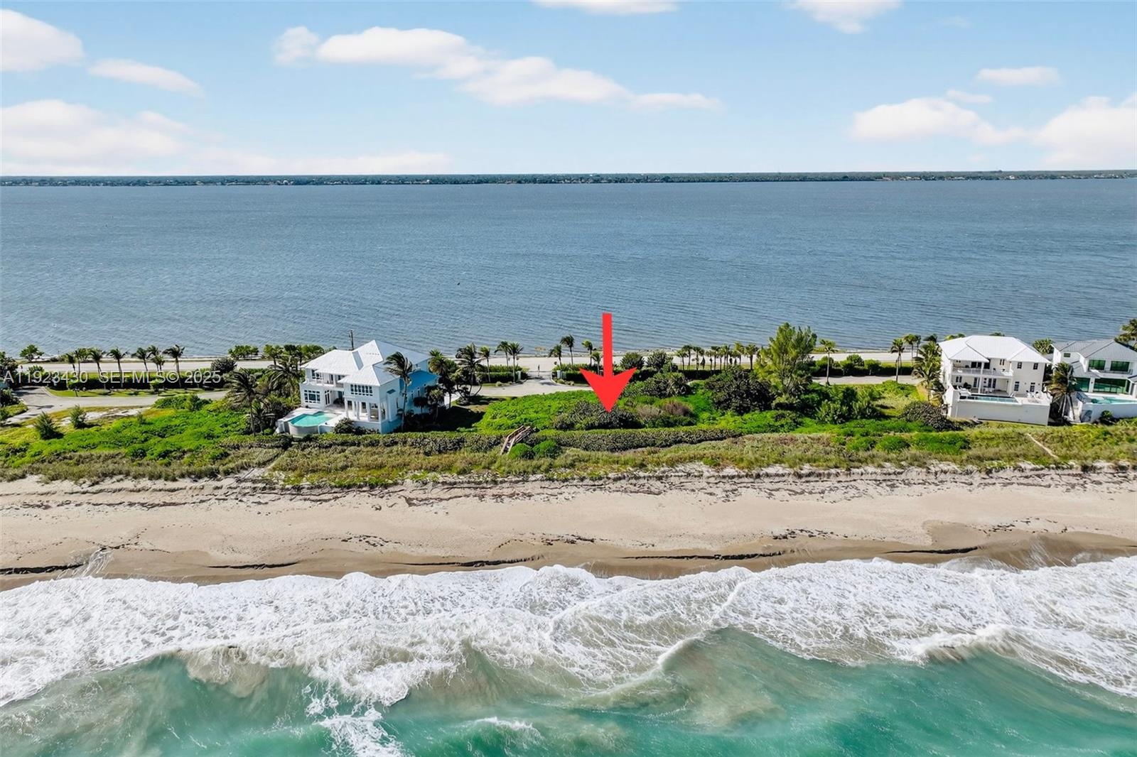 8308 South Ocean Drive Jensen Beach, FL 34957 - Photo 5 of 21 a view of a beach with ocean view
