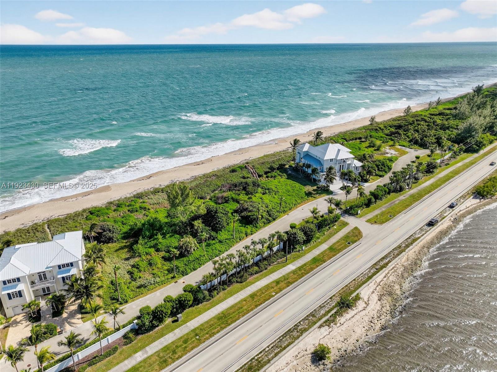 8308 South Ocean Drive Jensen Beach, FL 34957 - Photo 7 of 21 a view of beach with ocean view