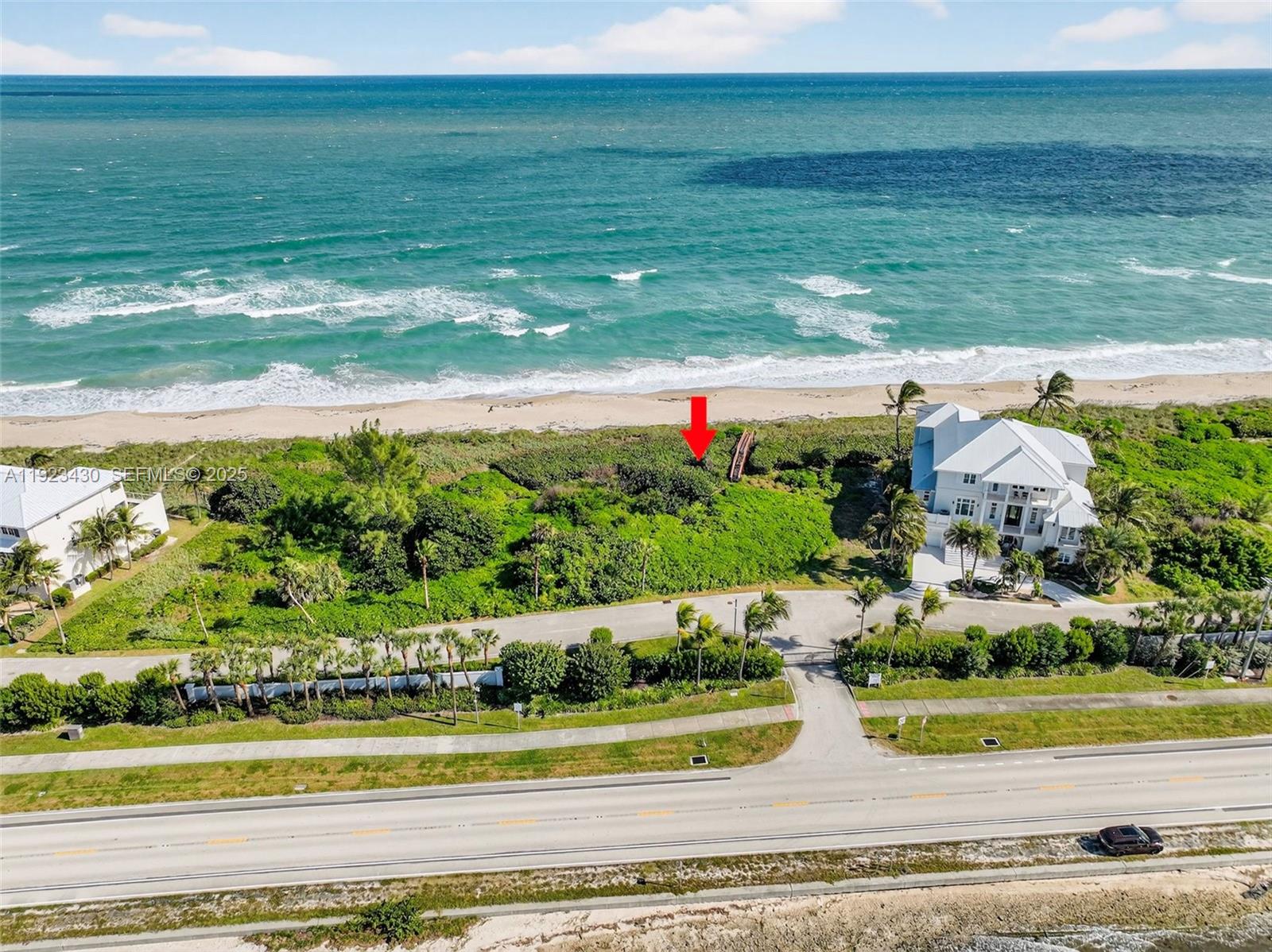 8308 South Ocean Drive Jensen Beach, FL 34957 - Photo 8 of 21 a view of a lake with a house