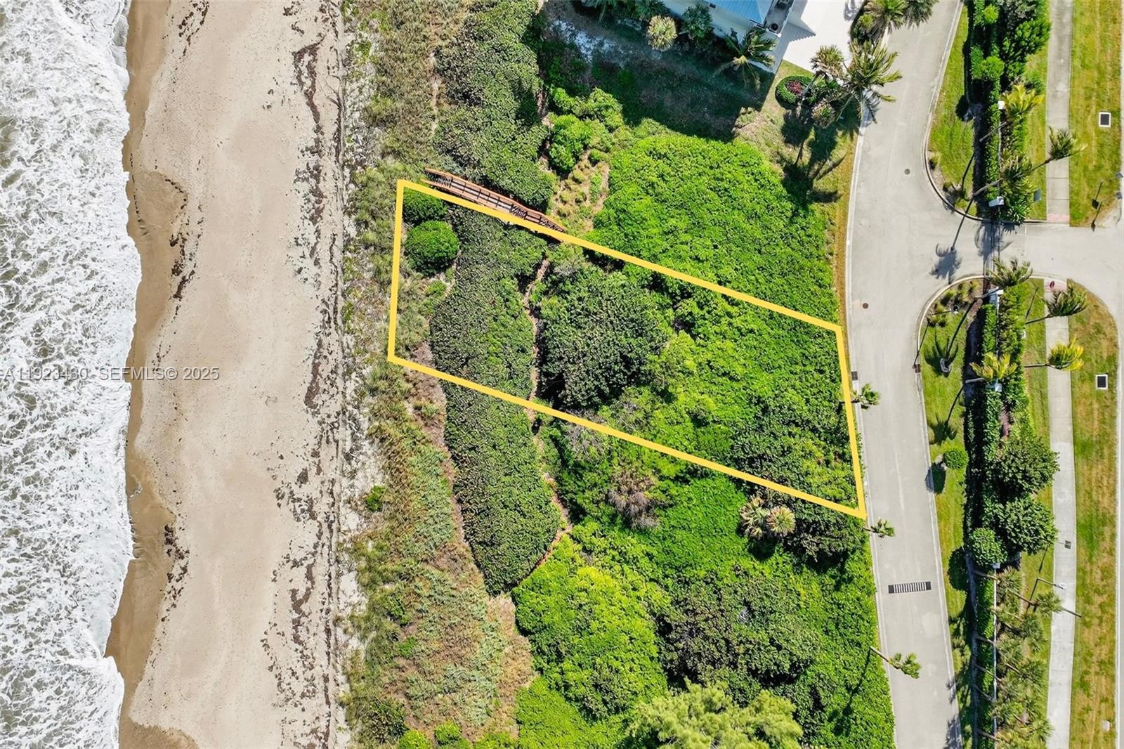 8308 South Ocean Drive Jensen Beach, FL 34957 - Photo 9 of 21 a view of a garden from a balcony