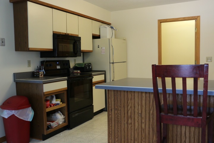 3442 Yale Bridge Road Rockton, IL 61072 - Photo 11 of 27 a kitchen with stainless steel appliances granite countertop a refrigerator a stove top oven a sink and dishwasher