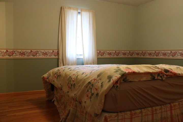 3442 Yale Bridge Road Rockton, IL 61072 - Photo 15 of 27 a bed sitting in a bedroom next to a window