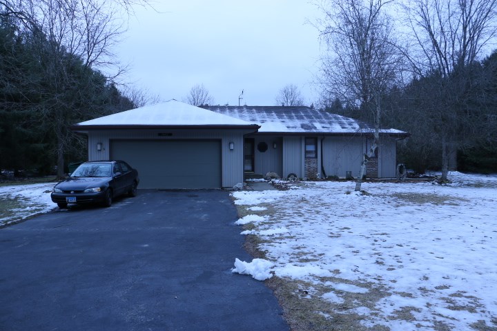 3442 Yale Bridge Road Rockton, IL 61072 - Photo 2 of 27 a view of a house with a yard and garage
