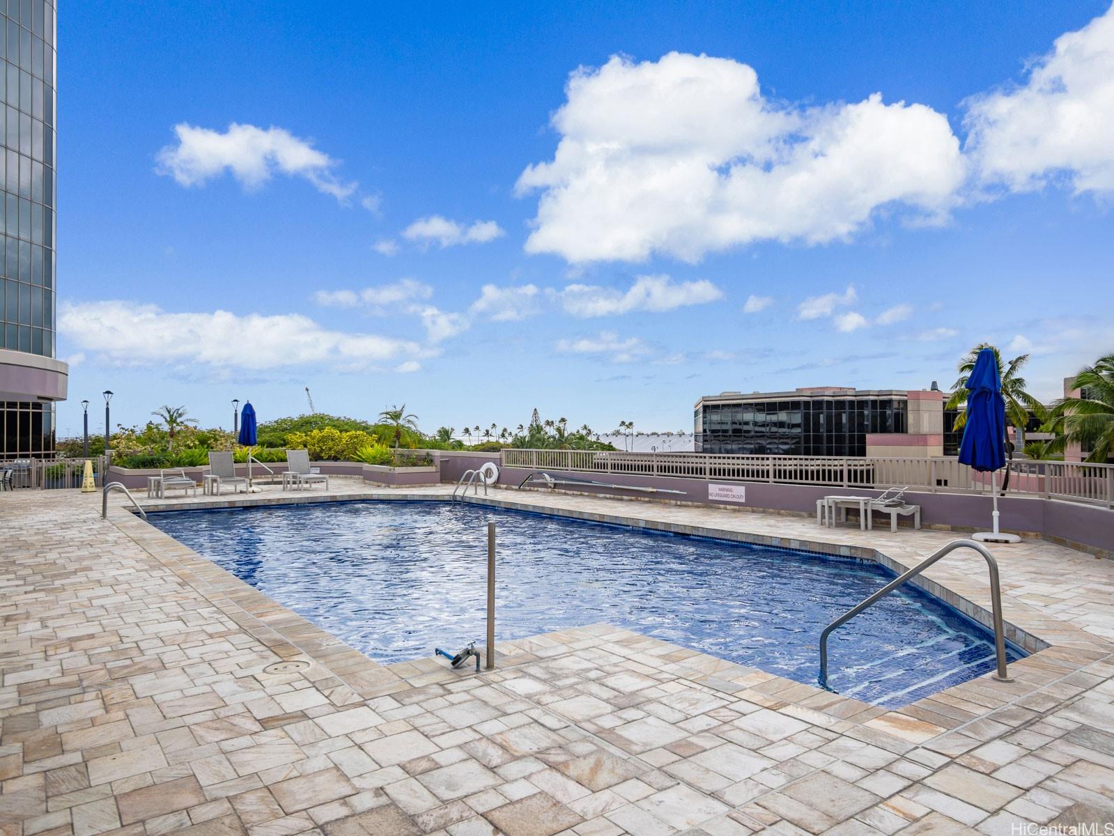 425 South Street, Unit 501 Honolulu, HI 96813 - Photo 18 of 25 a view of swimming pool with seating space and barbeque oven