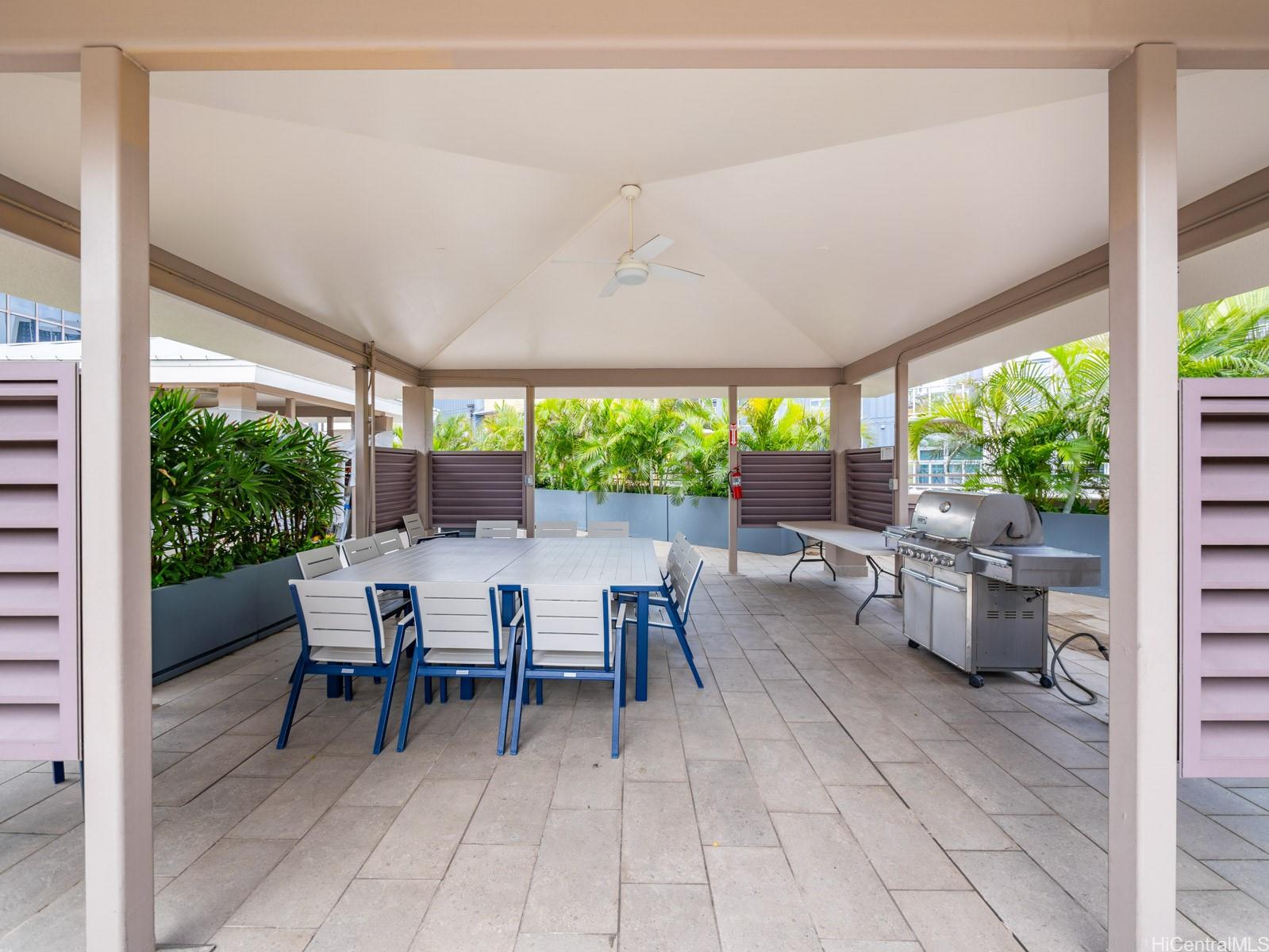 425 South Street, Unit 501 Honolulu, HI 96813 - Photo 19 of 25 a view of a dining room with furniture and garden view