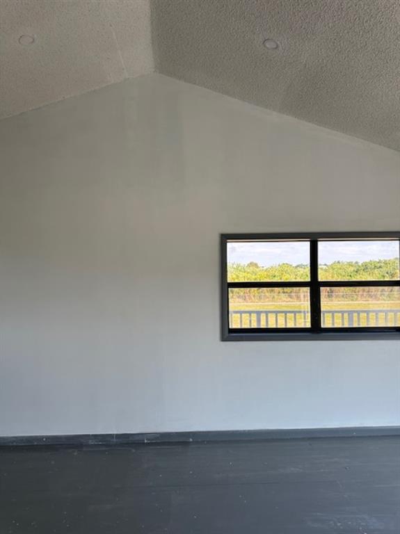 24001 Southwest 202nd Avenue Homestead, FL 33031 - Photo 15 of 17 an empty room with a window