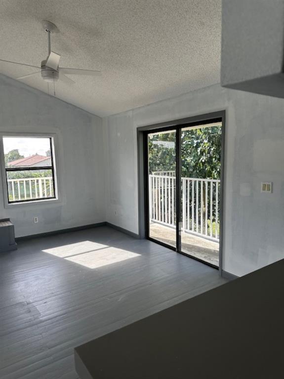 24001 Southwest 202nd Avenue Homestead, FL 33031 - Photo 6 of 17 a view of an empty room with a window