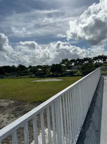 a view of a balcony with lake